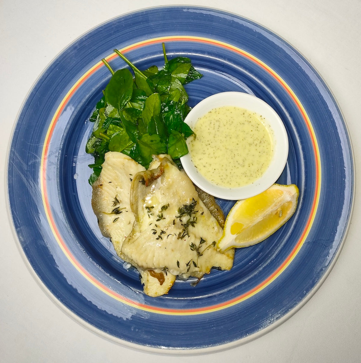 Oven Baked Fish Fillet with Baby Spinach Leaves